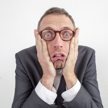 appalled manager terrified by corporate announcement expressed with humor