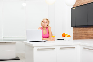 beautiful woman laptop sitting table home