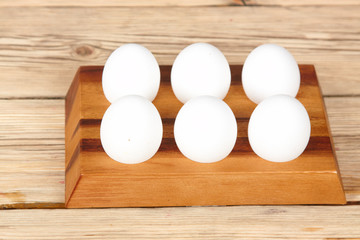 Dairy products on wooden table. Sour cream, milk, cheese, egg, 