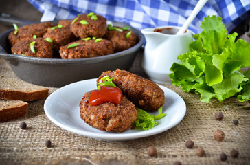 Beef burgers in bread, breaded