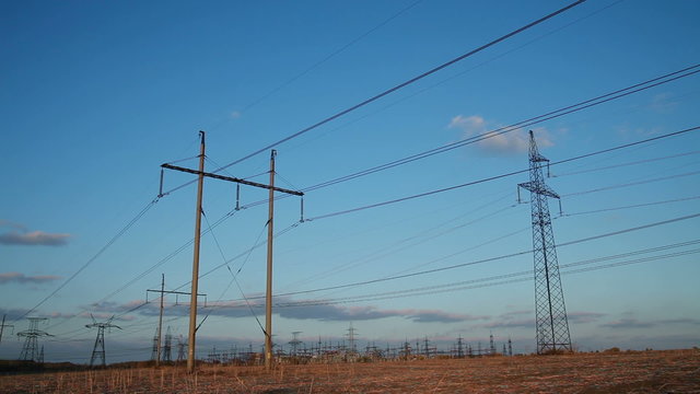 High-voltage Line. Poles With Wires at Sunset.