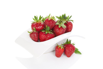 Strawberries in bowl isolated.