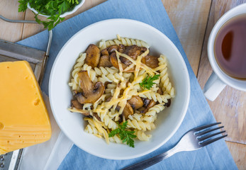 Pasta with mushrooms, cheese and fresh parsley