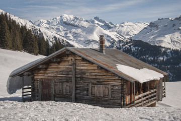 Typical hut and Mont Blanc massif. Alps, France