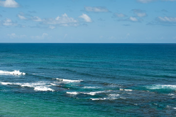 Caribbean sea with blue sky and clouds