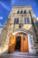entrance facade with open door; Bethel College Mennonite Church, North Newton, Kansas