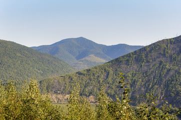 Far Eastern taiga. 
Autumn hills and mountains in autumn colors.