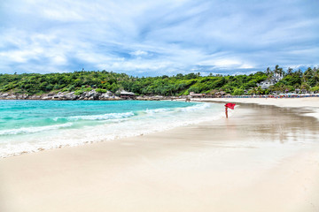 Turquoise waves on the island of Ko Racha Yai. Thai Phuket Province