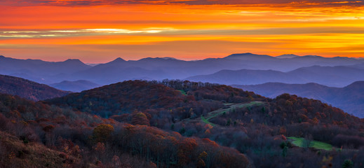 The surreal feel of an Appalachian Mountain sunrise on a cool autumn colorful scene along the Appalachian trail in North Carolina at Max Patch.
- 95293925