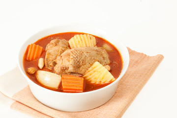 Chicken massaman red curry with vegetables and peanuts