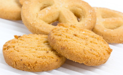 Close up a group of butter cookies isolated on white.