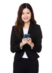 Businesswoman use of mobile phone