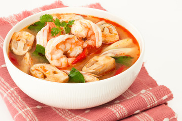 Tom Yum Kung - traditional thai spicy soup with shrimp and mushrooms