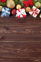 Christmas decorations on wooden board background with copyspace
