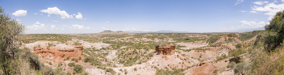 Fototapeta na wymiar Panoramic view of ravine Olduvai Gorge, one of the most important paleoanthropological sites in the world - the Cradle of Mankind. Great Rift Valley, Tanzania, Eastern Africa.