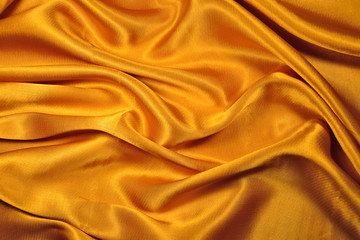 Gold fabric with soft folds.