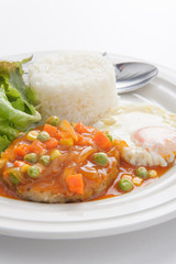 Rice with hamburg steak and fried egg, stock photo