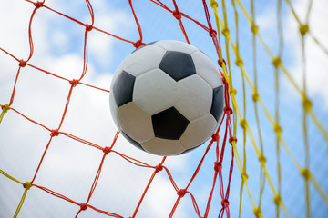 Naklejka premium soccer ball on goal