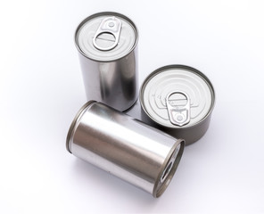 closed tin and long can with open key on white background