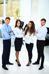 Obraz premium group of businesspeople standing together in office