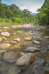Un-focus image of Brook and rocks in the mountains at Kiriwong v