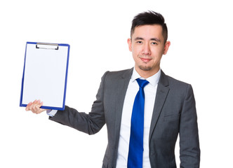 Young Businessman showing the blank page of clipboard