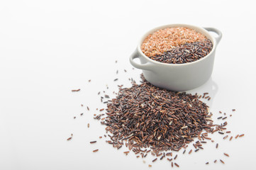 Three variety of rice: wild rice, red rice, and white rice. Shallow DOF