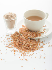 Rice milk in glass and rice crop isolated on white background. V