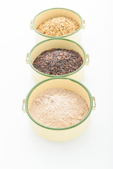 Three variety of rice: wild rice, red rice, and white rice. Shal