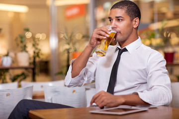 businessman drinking beer