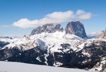 Fototapeta na wymiar Skiing area in the Dolomites Alps. Overlooking the Sella group in Val Gardena. Italy