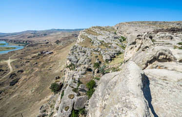 Fototapeta na wymiar ancient rock-hewn town called Uplistsikhe in Georgia