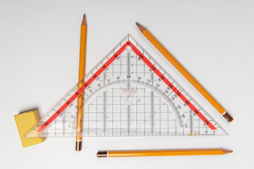 Simple pencils, eraser and ruler triangle