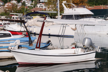 Fototapeta premium The image of an passenger motor boat in a hubborn of Tivat, Montenegro