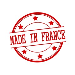 Made in France red stamp text on red circle on a white background and star