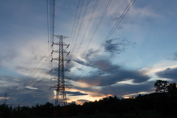 Hight voltage tower in sunset .