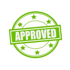 Approved white stamp text on circle on green background and star