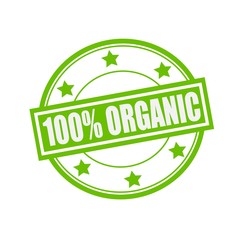 One hundred percent organic white stamp text on circle on green background and star