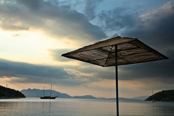 Parasol on a beach in the Peloponese in greece in the summer