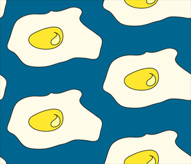 fried eggs on a blue background pattern