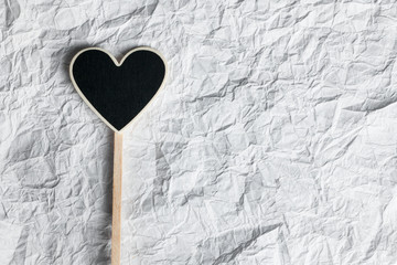 Wooden pointer in the shape of a heart