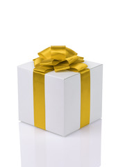 white paper gift box with yellow ribbon bow isolated