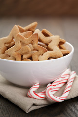 classic star cookies in white bowl with candy cane