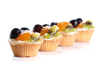 Fruit desserts on white background.