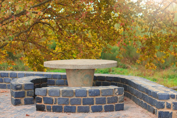 Picnic stone table in a secluded area for rest and relaxation
