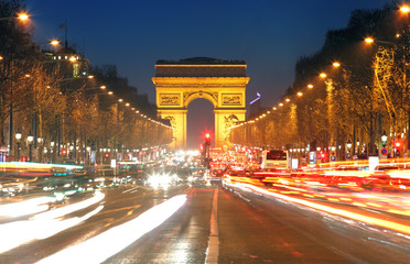 Fototapeta na wymiar Arc De Triomphe and light trails, Paris