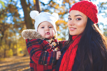 Happy family playing outdoors in park, Winter, autumn life