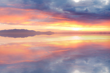 Sun Just Below Horizon at Still Seas