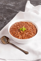 Chocolate rice pudding, decorated mint