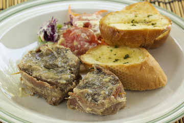 Grilled steak wrapped in bacon